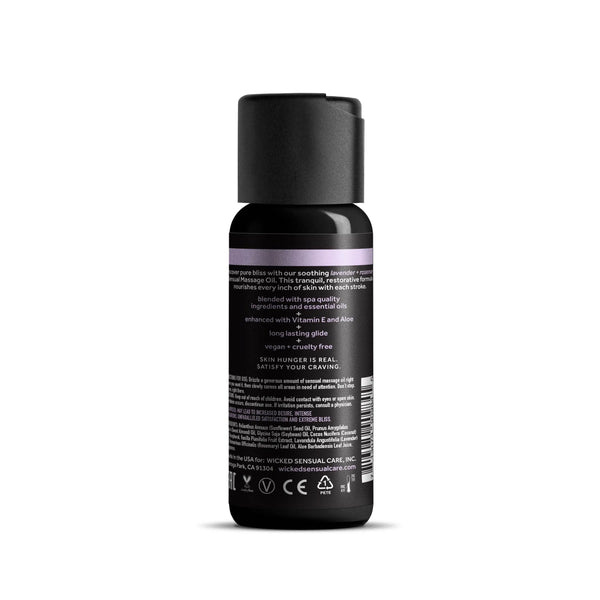 Back label of Wicked massage oil showing vegan and cruelty-free icons with ingredient details