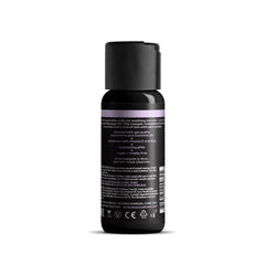 Back label of Wicked massage oil showing vegan and cruelty-free icons with ingredient details