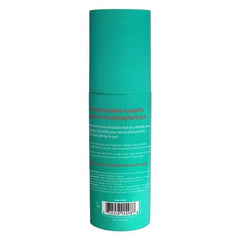 Back label of Yours Truly body mist showing product description and barcode on teal packaging