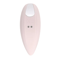 Back of Palm Vibrator displaying magnetic charging contacts and CE certification mark
