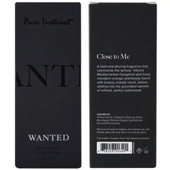 Back panel of Wanted box displaying scent notes and vegan pheromone ingredients list