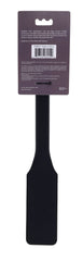 Back of retail card showing product description, materials, and barcode for silicone paddle