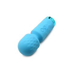 Bang! 10X Mini Silicone Wand lying on its side revealing metallic USB charging port at base
