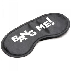 Bang Me! black satin blindfold with bold white text lettering and contoured eye shape