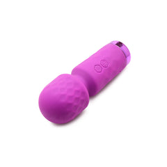 Bang mini wand lying on its side showing flexible neck bend and chrome accent base