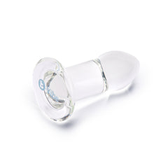 Base-forward angle of the glass anal dilator displaying the b-Vibe logo on the flat round base