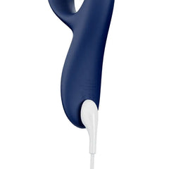 Base of the We-Vibe Nova 2 connected to a white magnetic USB charging cable