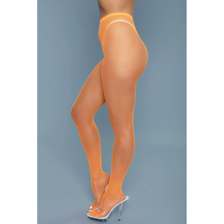Be Wicked Up All Night Pantyhose in orange fishnet, side profile showing full-length coverage