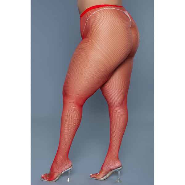 Be Wicked Up All Night red fishnet pantyhose, side-angle view showing mesh texture on plus-size model