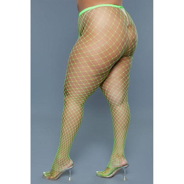 Be Wicked Can't Back Down neon green fishnet pantyhose, side-angle view on plus-size model
