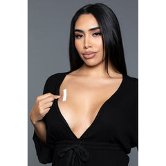 Be Wicked! clear double-sided fashion strip applied to chest area beneath deep-V neckline