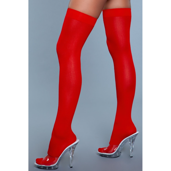 Be Wicked! red opaque nylon thigh highs shown from front on legs with clear heels