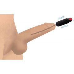 Beaded silicone sound inserted into urethral opening with vibrating bullet motor active