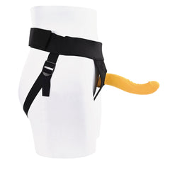 Black adjustable strap-on harness with yellow silicone dildo attached, side view on mannequin