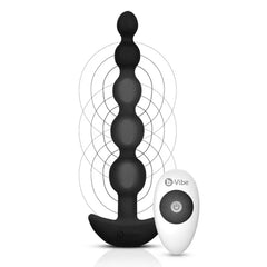 Black b-Vibe Cinco beaded anal toy beside wireless remote showing vibration wave pattern