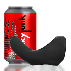 Black BUZZFUCK taint sling shown beside a standard soda can for size reference