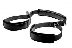 Black faux-leather thigh sling straps with silver buckles and padded neck support bar