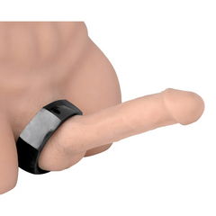 Black hexagonal cock ring shown fitted on a mannequin, illustrating flexible wear