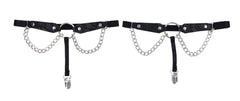 Close-up of black lace garter bands with silver ring hardware, dual chains, and adjustable clips