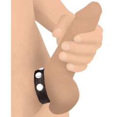 Black leather speed snap cock ring shown worn at base, silver snap closures