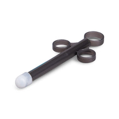 Black lube launcher applicator with two finger rings and soft rounded tip, angled view