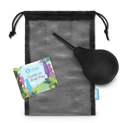 Black mesh drawstring storage bag beside enema bulb and anal play guide booklet