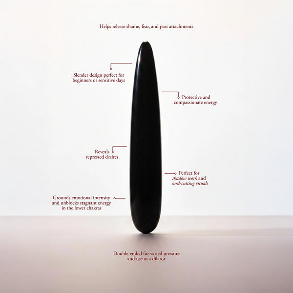 Black obsidian slim wand displayed upright with annotated feature callouts highlighting dual-ended design