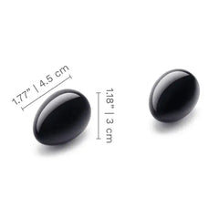 Black obsidian yoni eggs with size dimensions: 1.77in x 1.18in and 4.5cm x 3cm