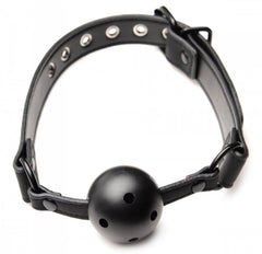 Black perforated ball gag with adjustable faux-leather strap and metal buckle closure