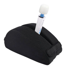 Black positioning wedge with wand massager secured vertically in the mounting slot