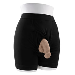 Black shorts on a mannequin with the light Gender X packer visible through the leg opening
