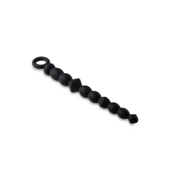 Black silicone anal beads laid flat showing graduated bead sizing and retrieval loop