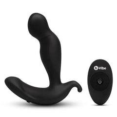 Black silicone b-Vibe 360 Plug beside compact oval wireless remote control