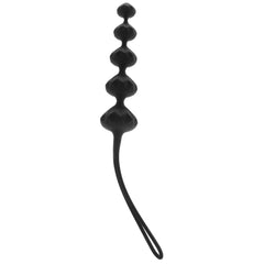Close-up of black silicone diamond-shaped anal beads with flexible loop retrieval strap