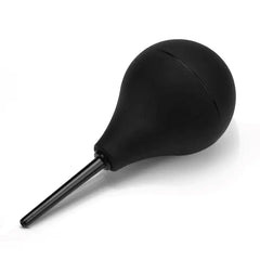 Black silicone enema bulb angled sideways, showing smooth matte texture and nozzle
