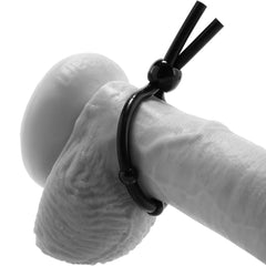 Black silicone lasso ring with beads shown fitted on a product model demonstrating adjustable sizing