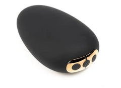 Black silicone palm vibrator with rose gold control buttons from the Je Joue gift set
