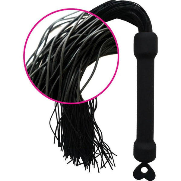 Close-up of black silicone tassels and ergonomic handle grip on the Whip It flogger