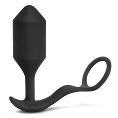 Black silicone weighted anal plug with attached cock ring, side profile view
