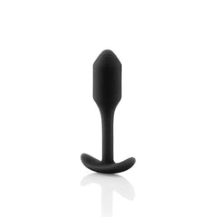 Black silicone weighted plug with precision-shaped tip and slim neck for comfortable extended wear