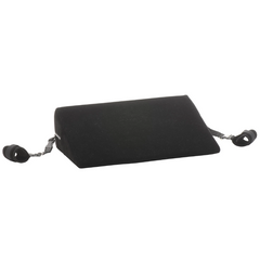 Black wedge-shaped bondage cushion with attached restraint straps and D-ring connectors, side angle
