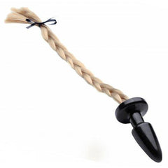 Blonde braided pony tail attached to a smooth black anal plug with ribbon tie detail