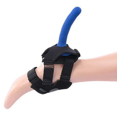 Blue curved silicone dildo secured in foot harness showing adjustable buckle strap system