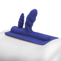 Blue glitter Two-Nicorn attachment balanced on a curved white surface, showing dual-tip design