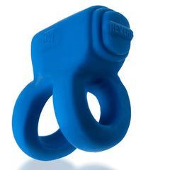 Blue silicone REVHAMMER dual cock ring close-up showing textured vibe housing top