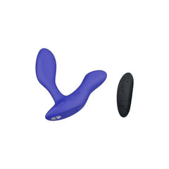 Blue We-Vibe Vector+ prostate massager displayed alongside its included wireless remote control