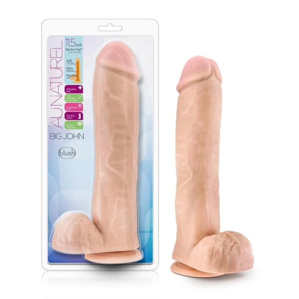 Blush Au Naturel Big John 11.5" realistic dildo with suction base, shown beside retail packaging