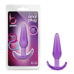 Blush B Yours Slim Anal Plug in purple with tapered tip, shown beside retail packaging