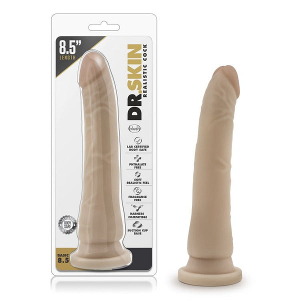 Blush Dr. Skin Basic 8.5 In beige realistic dildo with suction cup base, shown beside retail packaging