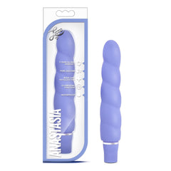 Blush Luxe Anastasia vibrator in periwinkle silicone beside its retail box packaging